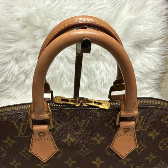 Louis Vuitton Monogram Alma Handbag - Picture 9 of 16